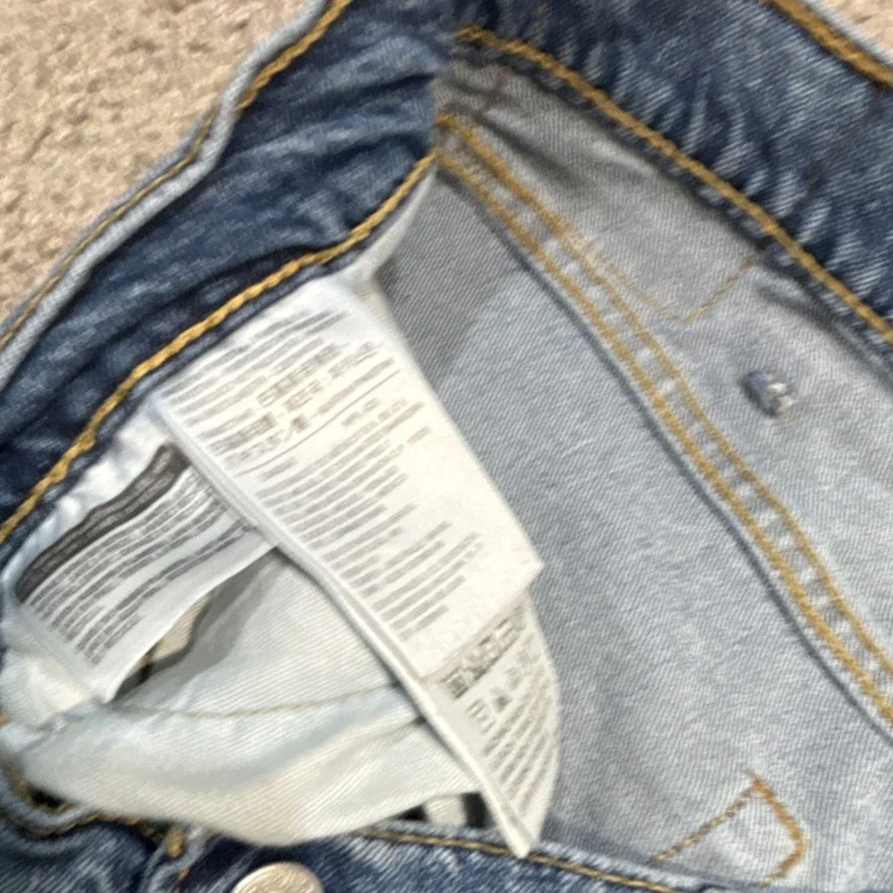 Levi's Men's Blue Denim Jeans Medium Wash Tapered‎ 5-Pocket Logo Cotton